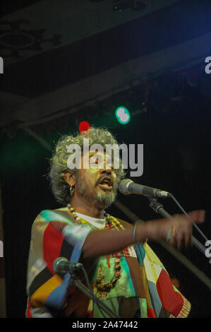 Paban Das Baul performs on a stage. He is known for pioneering traditional Baul music on the international music scene and for establishing a genre of Stock Photo