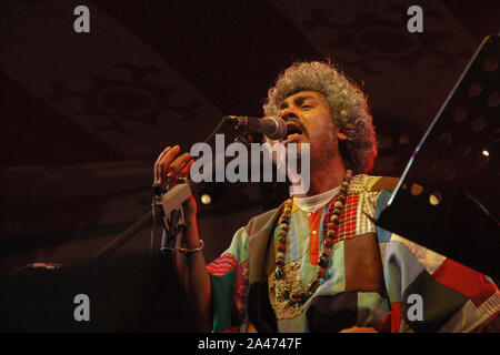 Paban Das Baul performs on a stage. He is known for pioneering traditional Baul music on the international music scene and for establishing a genre of Stock Photo