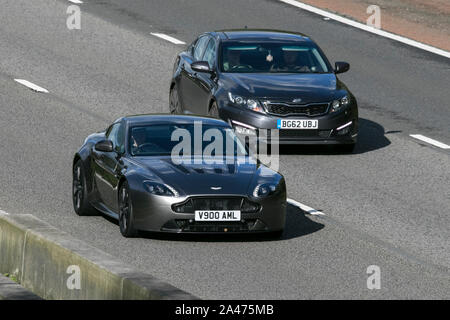 2014 Aston Martin Vantage S V12 Auto; traveling on the M6 motorway near Preston in Lancashire, UK Stock Photo