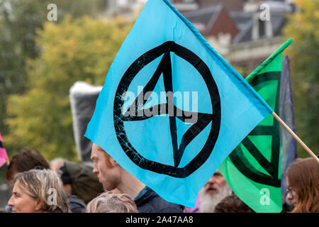 Logo On A Flag At The Blauwebrug At The Climate Demonstration From The Extinction Rebellion Group At Amsterdam The Netherlands 2019 Stock Photo