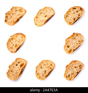 Frame of pieces of white bread isolated on white background. Stock Photo