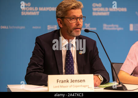 COPENHAGEN, DENMARK – OCTOBER 11, 2019:  Frank Jensen, Lord Mayor of Copenhagen, Denmark, speaks at the ‘Mayors and Youth Activist’ press conference at the C40 World Mayors Summit. During the press conference young activist explained what they expect of the grown-up politicians. More than 90 mayors of some of the world’s largest and most influential cities representing some 700 million people meet in Copenhagen from October 9-12 for the C40 World Mayors Summit. The purpose with the summit in Copenhagen is to build a global coalition of leading cities, businesses and citizens that rallies aroun Stock Photo