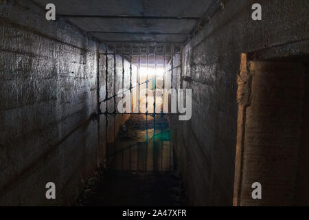 An underground tunnel in an abandoned bunker Stock Photo