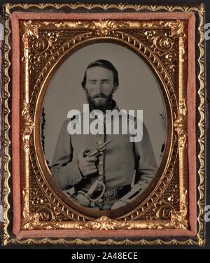 First Lieutenant Job Dillingham Barnard of Co. K, 25th North Carolina Infantry Regiment in uniform with revolver and sword Stock Photo