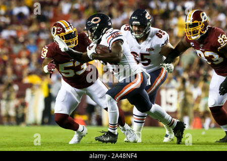 Chicago Bears center Cody Whitehair (65) huddles with teammates against the  New York Giants during an NFL football game Sunday, Oct. 2, 2022, in East  Rutherford, N.J. (AP Photo/Adam Hunger Stock Photo - Alamy