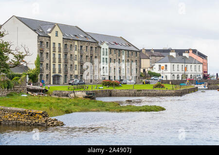 WESTPORT, IRELAND - AUGUST 7, 2019:  Traditional buildings overlooking Westport Harbour in County Mayo, Ireland. Stock Photo