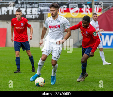 Semi BELKAHIA (TSV Munich 1860), action, duels versus Ayguen YLDIRIM (Verl).  Soccer 3rd league, Liga3, TSV Munich 1860 - SC Verl on April 10th, 2021 in  Muenchen GRUENWALDER STADION. DFL REGULATIONS PROHIBIT