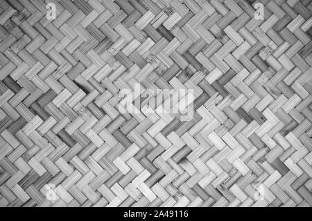 Full Frame Shot Of Wicker Basket. Black and White background and Texture. Dark tone. Stock Photo
