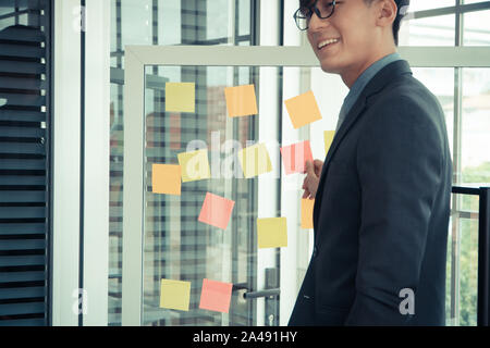 Business man presenting project plan and task in Agile process for team  in meeting room for brainstorm business strategy for startup. Concept of team Stock Photo
