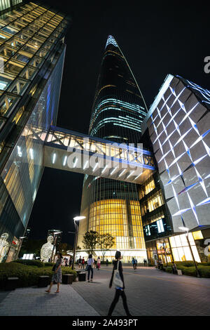 Seoul Korea , 20 September 2019 : Vertical full night view of the Lotte World tower a supertall skyscraper in Songpa Seoul South Korea Stock Photo