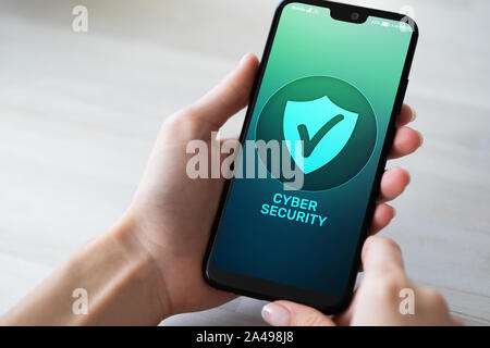 Mobile phone cyber security information privacy and data protection internet technology and business concept Stock Photo