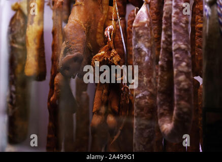 Chorizo hanging on charcuterie cured, pork details Stock Photo