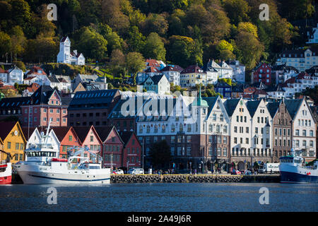 Houses on a hillside and boats in the harbour Bergen, Norway Stock Photo