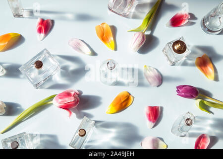 Perfume bottles with the spring tulips