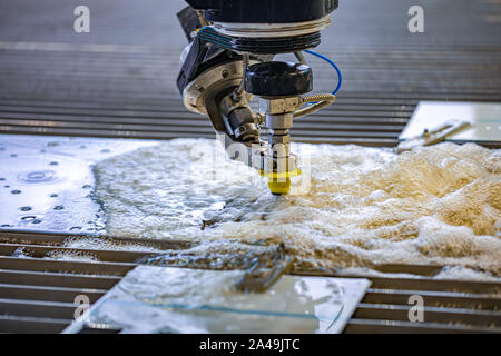 CNC water jet cutting machine modern industrial technology. Stock Photo