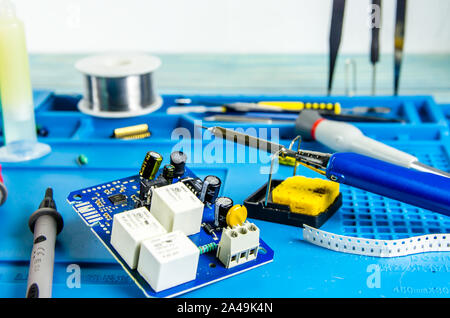 The electrician's workplace. Electronics. Schemes soldering iron Stock Photo