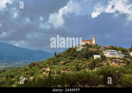 Orthodox church with a bell tower on top of the hill on Zakynthos island in Greece Stock Photo