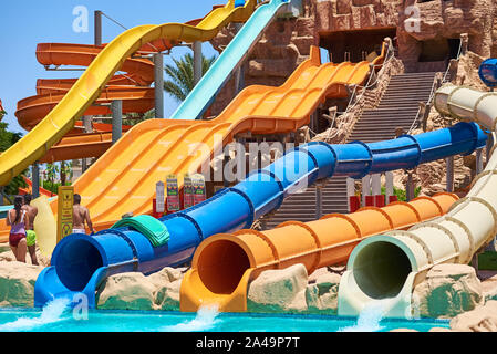 Colorful water slides in aqua park Stock Photo - Alamy