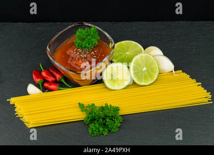 Spaghetti al Salmone - Noodles with Shrimps an salmon filet Stock Photo