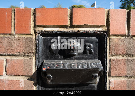 Kent, United Kingdom - September 15, 2019: An old Post Office box set in brickwork at the Knockholt Station of the Southeastern Line. Stock Photo