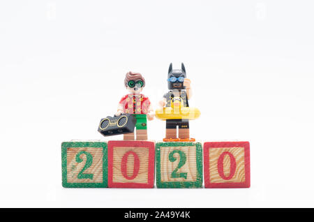 lego batman and robin celebrating year 2020. Lego minifigures are manufactured by The Lego Group. Stock Photo