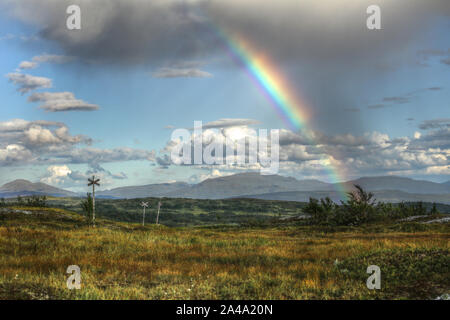 Rainbow in Blasjofjalls nature reserve near the Wilderness Road in Sweden. Stock Photo