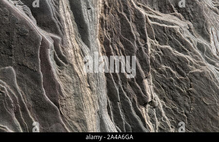 Sedimentary sandstone textured and coloured background Stock Photo