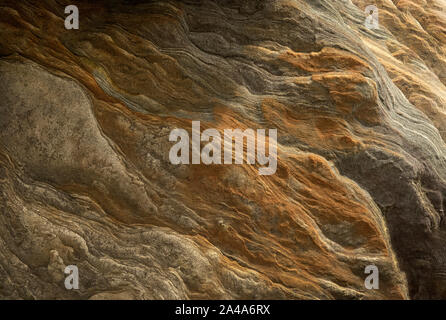 Sedimentary sandstone textured and coloured background Stock Photo