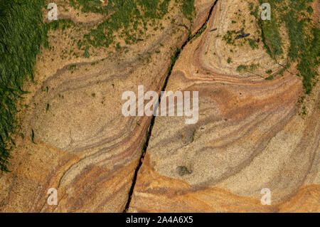 Sedimentary sandstone textured and coloured background Stock Photo