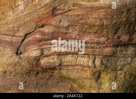 Sedimentary sandstone textured and coloured background Stock Photo