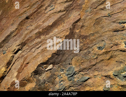 Sedimentary sandstone textured and coloured background Stock Photo