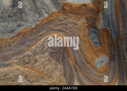 Sedimentary sandstone textured and coloured background Stock Photo