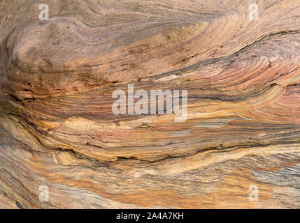 Sedimentary sandstone textured and coloured background Stock Photo