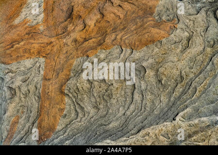 Sedimentary sandstone textured and coloured background Stock Photo
