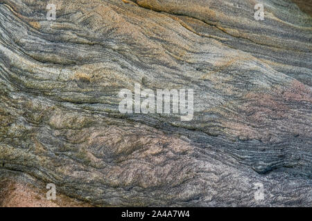 Sedimentary sandstone textured and coloured background Stock Photo