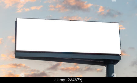 Mock up image - wide blank white billboard and clouds against sunset blue sky Stock Photo