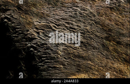 Sedimentary sandstone textured and coloured background Stock Photo
