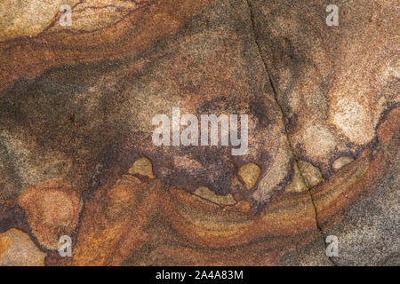 Sedimentary sandstone textured and coloured background Stock Photo