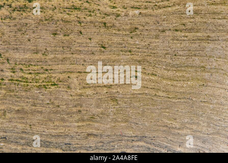 Sedimentary sandstone textured and coloured background Stock Photo