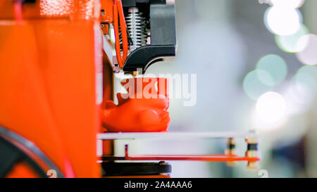 Three dimensional printing machine prints physical 3D model Stock Photo