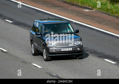 Range Rover Vogue (driver & passengers) driving on steep scary off-road ...