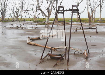 Abandoned games for children inside the ruins of Epecuen, Buenos Aires province, Argentina. Stock Photo