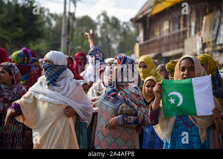 October 11, 2019, Srinagar, Jammu and Kashmir, India: Kashmiri protesters shout anti Indian and pro freedom slogans during the demonstration..After Friday prayers hundreds of people took part in a demonstration in the Soura neighborhood. Tensions have been escalating since the Indian government removed the region's partial autonomy three weeks ago. Information has also been scarce, as internet and mobile networks have been blocked. (Credit Image: © Idrees Abbas/SOPA Images via ZUMA Wire) Stock Photo