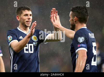 Scotland's John McGinn (right) celebrates scoring his sides firs goal of the game with teammate Ryan Christie during the UEFA Euro 2020 qualifying match at Hampden Park, Glasgow. Stock Photo