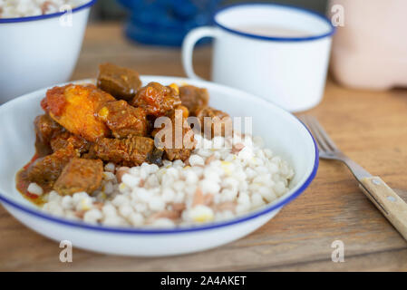 Traditional South African Samp and Beans with Beef Stew Stock Photo