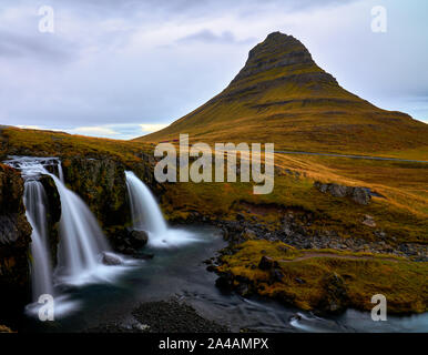 Kirkjufell (Church Mountain) mountain in Autumn colours in Snaefellsnes peninsula, Iceland on overcast early October afternoon in 2019. Stock Photo