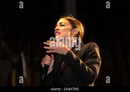 COPENHAGEN, DENMARK – OCTOBER 11, 2019:  Alexandria Ocasio-Cortez, a US politician elected in 2018 as the youngest ever to have a seat in the House of Representatives, speaks to the thousands of people who participated in the People Climate March, which marks the conclusion of the C40 World Mayors Summit.  More than 90 mayors of some of the world’s largest and most influential cities representing some 700 million people meet in Copenhagen from October 9-12 for the C40 World Mayors Summit. The purpose with the summit in Copenhagen is to build a global coalition of leading cities, businesses and Stock Photo