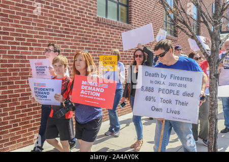 Tulsa USA 3 24 2018 People with signs for gun control protest and march on downtown street in Oklahoma Stock Photo