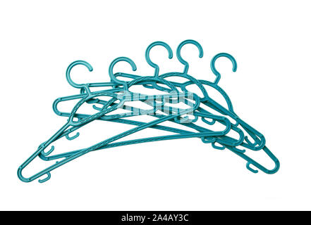 Heap of plastic hangers isolated on white background. Many racks as sale concept Stock Photo