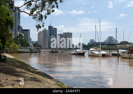 After recent floods to hit Brisbane, the swollen river Brisbane at a high level seen from the Botanic Gardens towards the Story Bridge in Queensland, Stock Photo